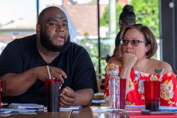 qushaun_and_jennifer_at_airport_rage_mtg-ord.jpg